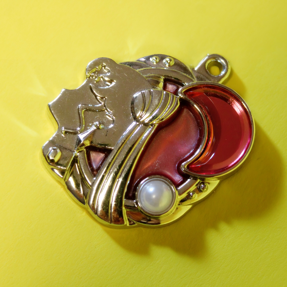 Elegant Gold and Red Pendant